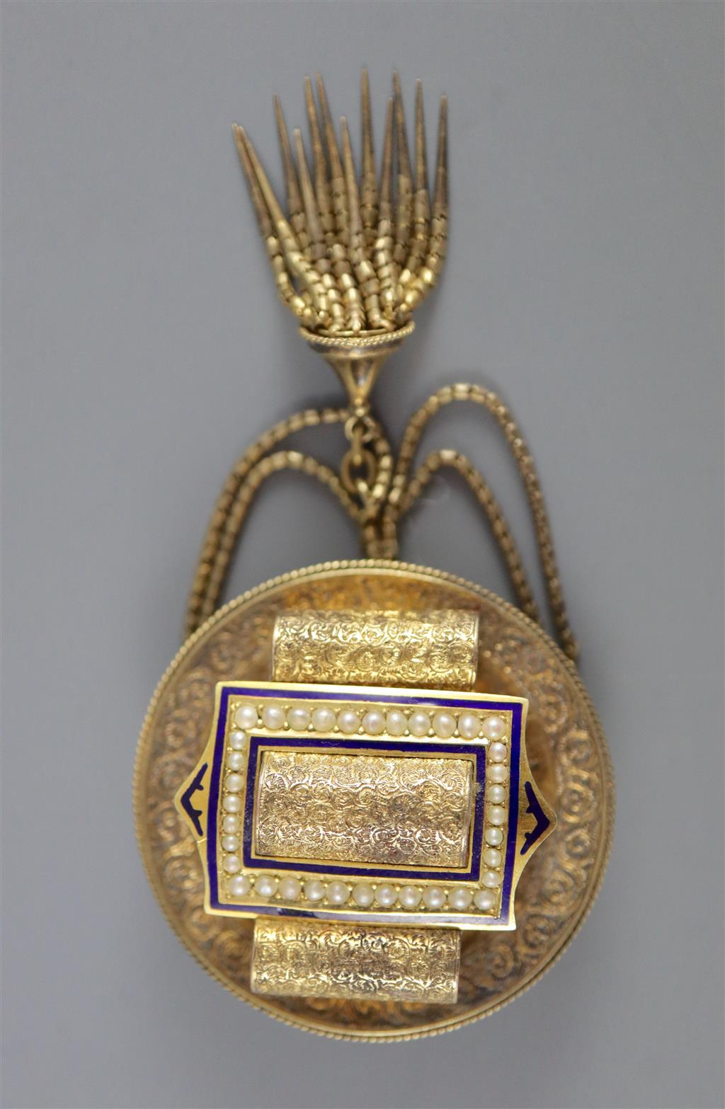 A Victorian gold (tests as 14ct), pearl and blue enamel tassel brooch with central buckle motif and a pair of matching earrings,